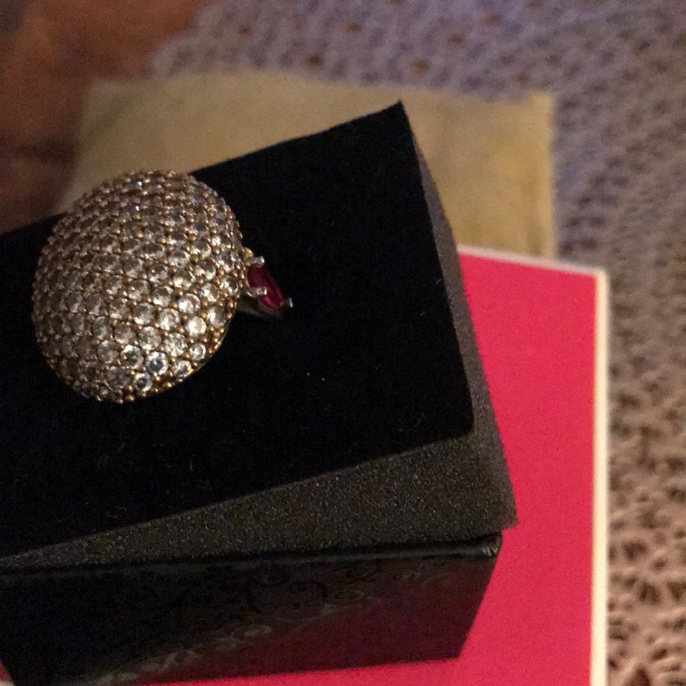 New in box sterling silver with red rubies on side